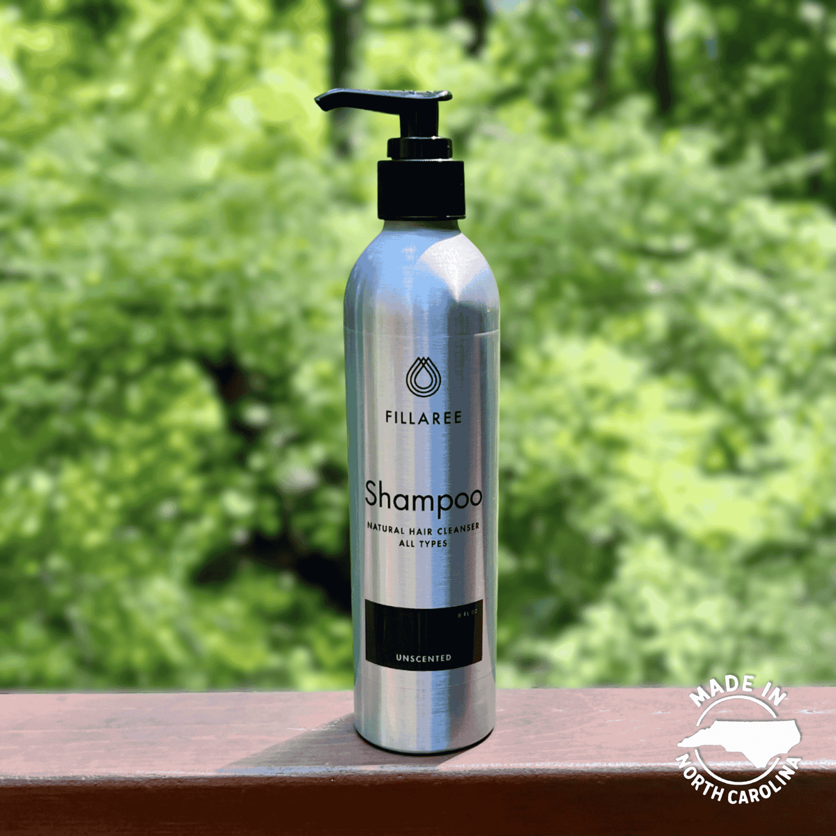 Fillaree Unscented Refillable Shampoo, Made in North Carolina, green leaves background