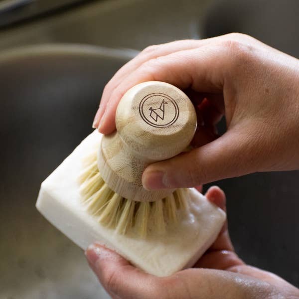 Compact 3.5 inch Green Llama solid dish soap - Plastic-free and compostable kitchen cleaning bar.