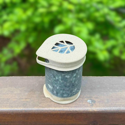 Stem shampoo bar in coconut hinoki scent with recyclable cap and coated in beeswax to prevent dissolving