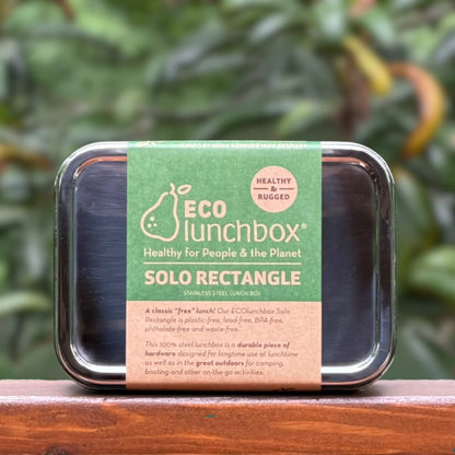 ECOlunchbox Solo Rectangle stainless steel lunch box wrapped in its green and brown paper product packaging label outside.