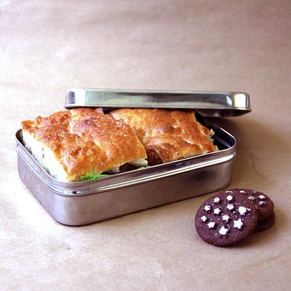 For a lifestyle food shot:A fresh sandwich packed neatly inside the single compartment of an ECOlunchbox Solo Rectangle stainless steel lunch box.