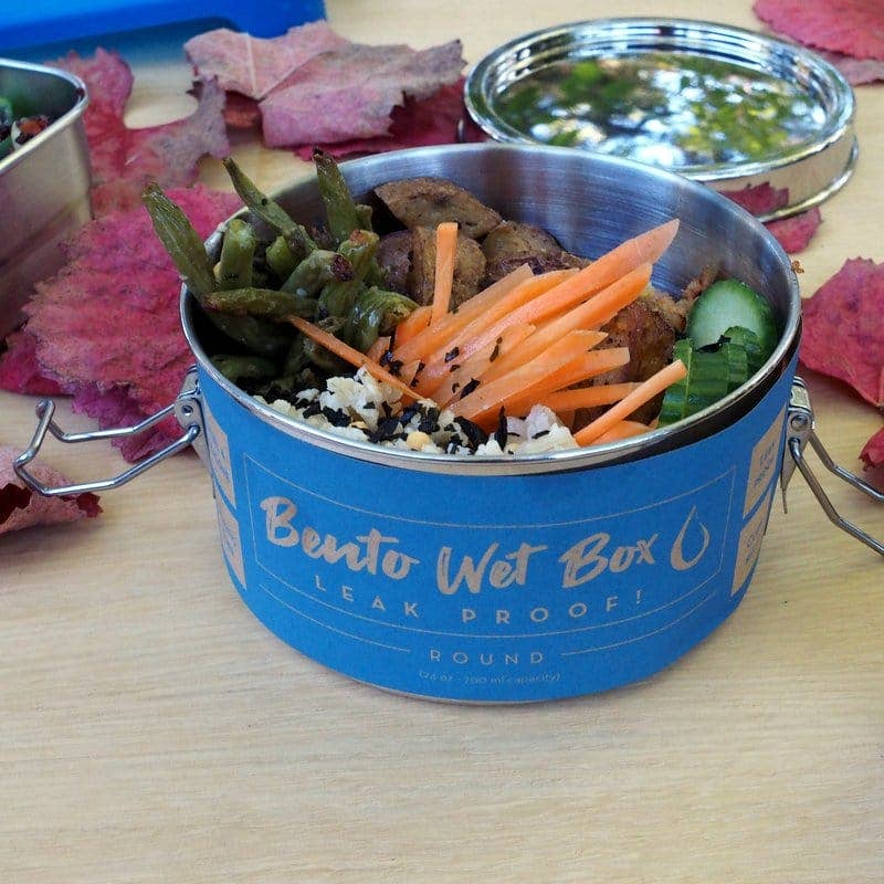 ECOlunchbox Bento Wet Box Round stainless steel container filled with rice lunch